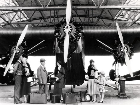 1920s-1930s-passengers-waiting-in-front-of-ford-trimotor-airplane