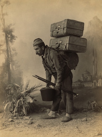 turkish-porter-carrying-luggage-on-his-back-portrait-by-abdullah-freres-ca-1890