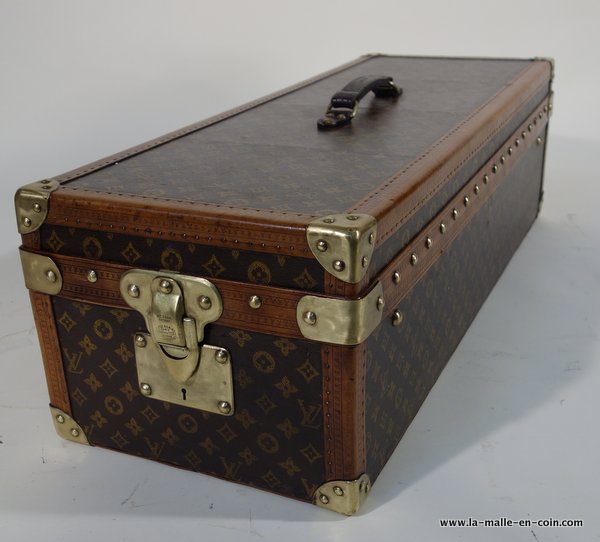 A leather bound 'Osilite' trunk by H.J. Cave & Sons, inscribed for