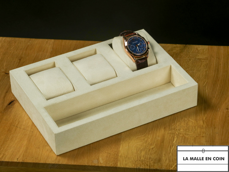 Cream colored tray with watch slots
