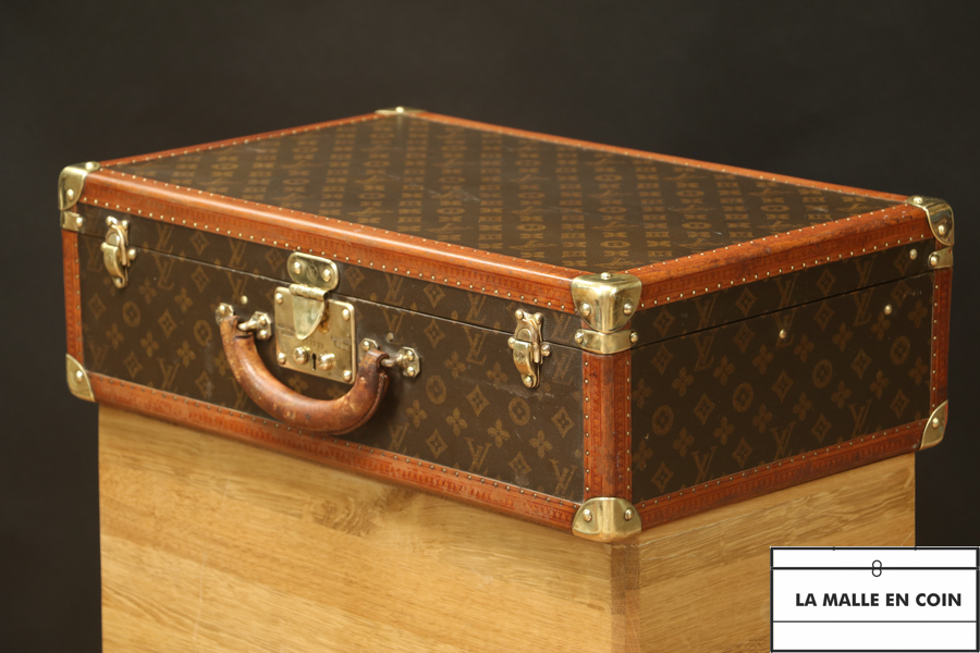 Valise Louis Vuitton en toile monogram et lozine