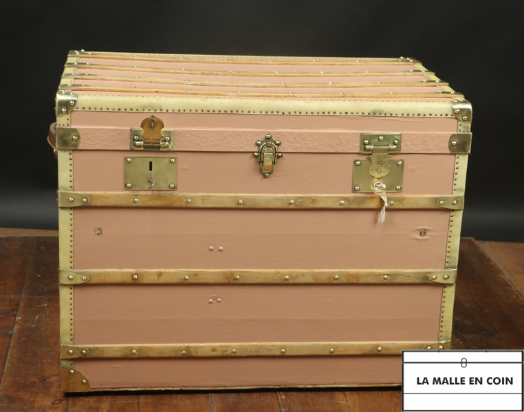 Salmon color flat trunk with key