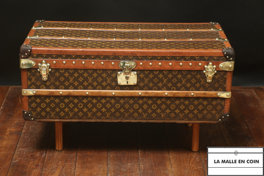 Monogram cabin trunk from the luxury brand Louis Vuitton with its base