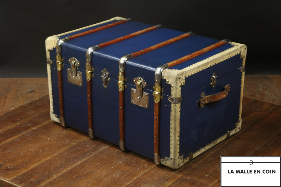 This curved blue steamer trunk is a vintage and very practical storage 