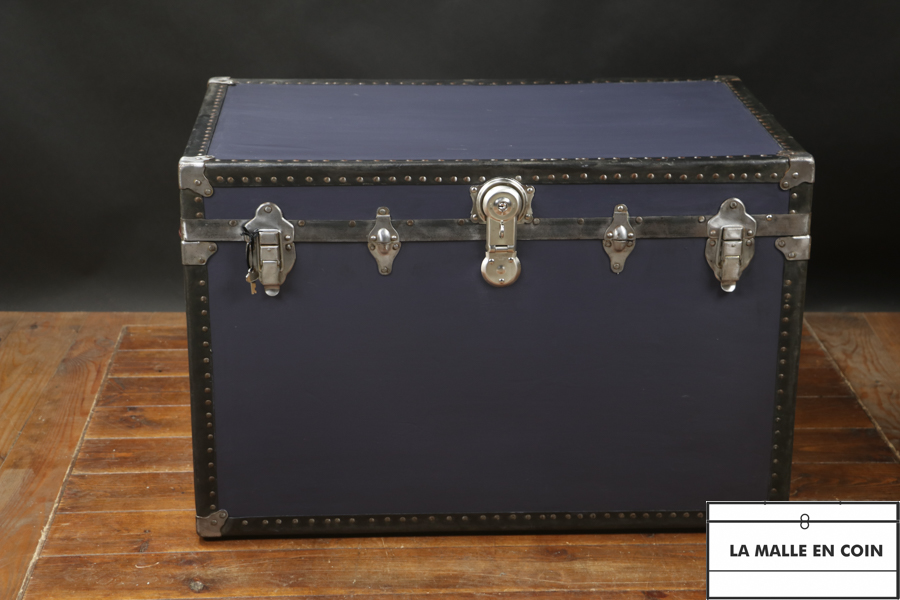 Blue American steamer trunk with its key