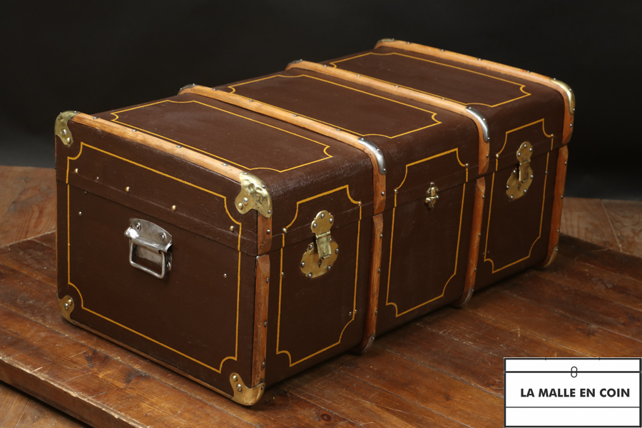 Curved brown steamer trunk