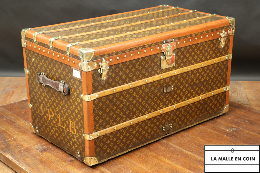 Sold at Auction: LOUIS VUITTON STEAMER TRUNK Exterior with all over LV  monogram with beechwood slats, brass lock and handles and hardware.Interior  fi