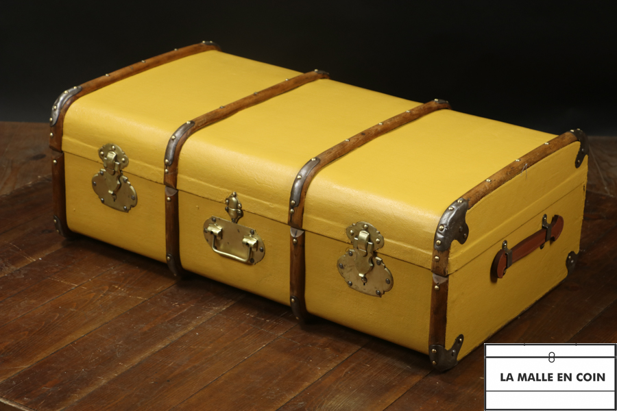 Yellow curved cabin trunk