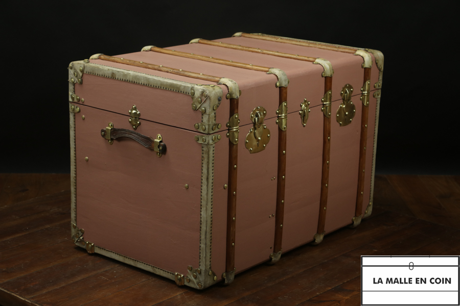 Pink curved steamer trunk