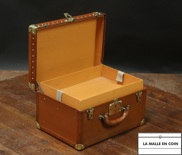 Orange Louis Vuitton hat trunk