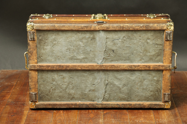 This Louis Vuitton cabin trunk with stenciled monogrammed canvas is ideal  for a coffee table