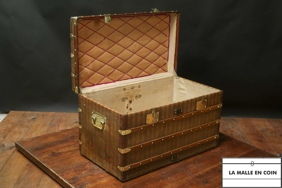 This magnificent striped steamer trunk from the Louis Vuitton