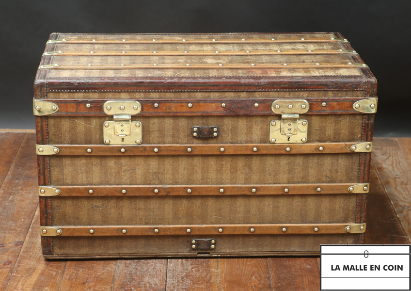 This magnificent striped steamer trunk from the Louis Vuitton