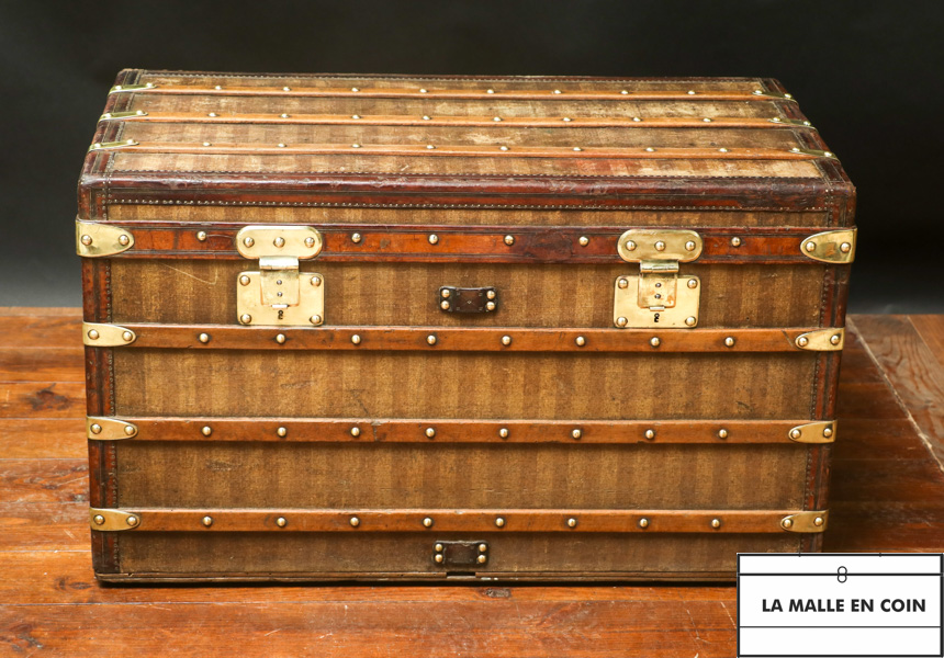 This magnificent striped steamer trunk from the Louis Vuitton