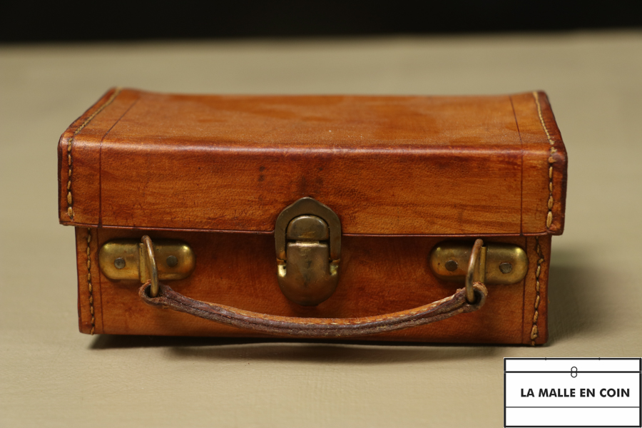 Mini leather suitcase, identical to the model for dolls from the luxury brand Louis Vuitton