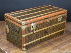 Moynat monogrammed steamer trunk