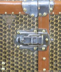 M monogrammed wardrobe trunk by Moynat.