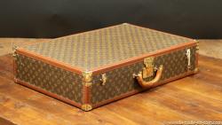 Louis Vuitton suitcase, with key 