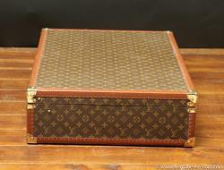 Louis Vuitton suitcase, with key 