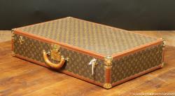 Louis Vuitton suitcase, with key 