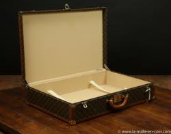 Louis Vuitton suitcase, with key 