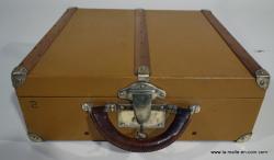 Moynat suitcase with its No. 2 key