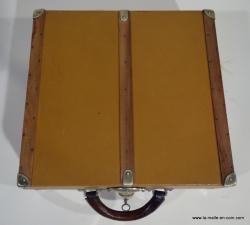 Moynat suitcase with its No. 2 key