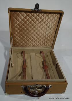 Moynat suitcase with its No. 3 key