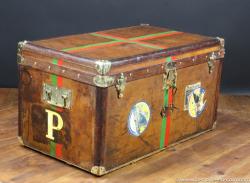 Leather Goyard steamer trunk with key