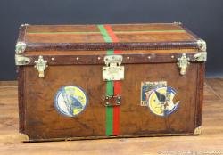 Leather Goyard steamer trunk with key