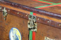 Leather Goyard steamer trunk with key